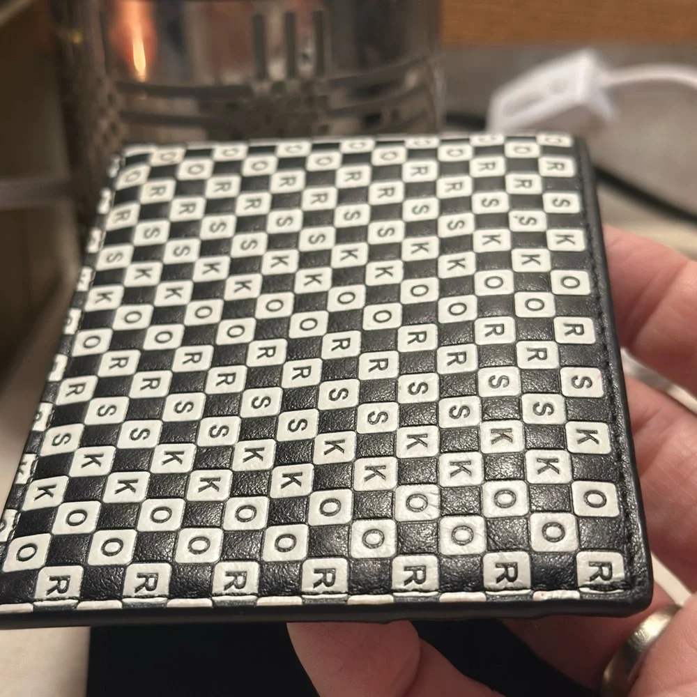 Michael Kors Cooper bilfold bifold wallet. Black and white. Used, mild wear